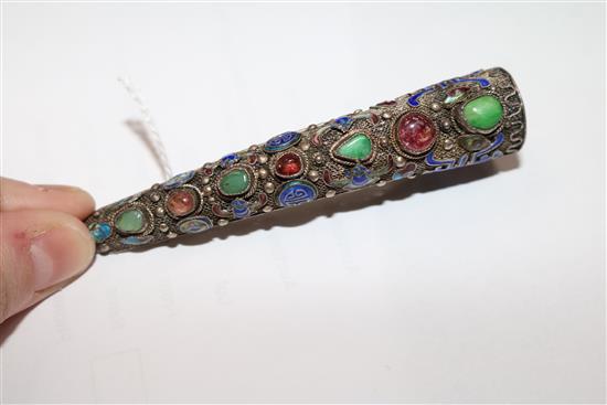 A late 19th/early 20th century Chinese silver filligree, enamel and gem set nail guard, 86mm.
